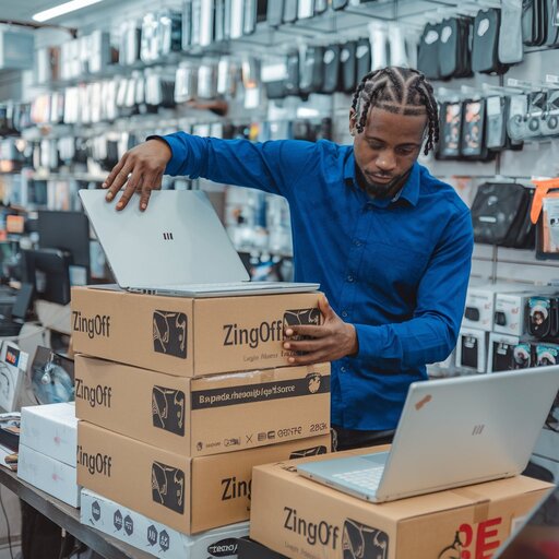 a-bustling-nigerian-tech-store-with-a-bl_38_FlFhJQ7W43UaFfPrK-A_e5EjQ3J0Sp-YGre9N2bHaw (1)